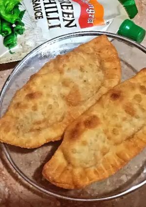 A picture of D shape samosa.