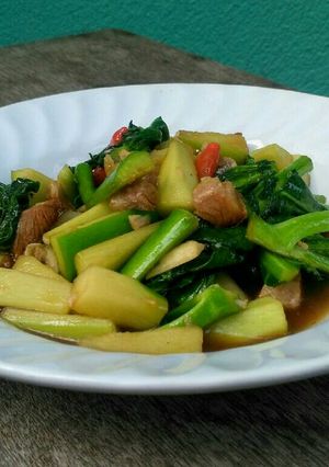 A picture of Sauteed Kale with Crispy Salted Mackerel Fish.