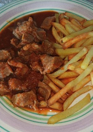 Una foto de Taquitos de carne en salsa de tomate