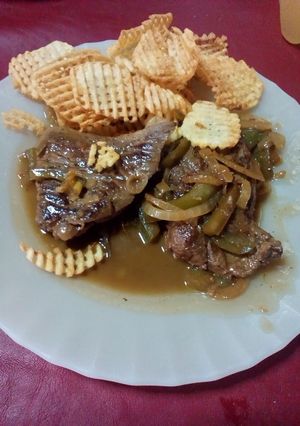 Una foto de Bifes al disco con sidra