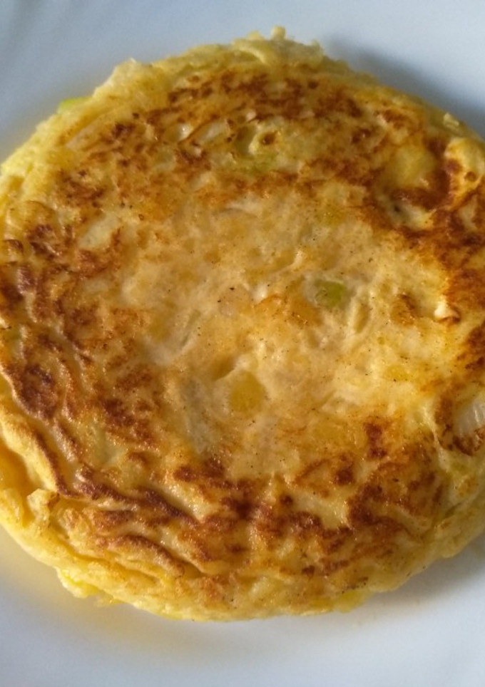 Una foto de Tortilla de patatas y calabacín