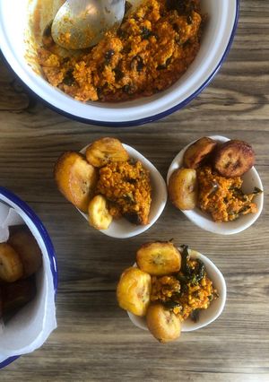 A picture of Nigerian Breakfast Scrambled Wara (tofu) in Obe-Ata w/ Plantain.
