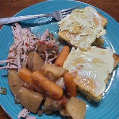 Slow cooked pork tenderloins with vegetables A picture of Slow cooked pork tenderloins with vegetables.