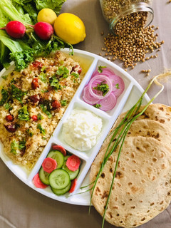 A picture of White Maash with white butter and roti.