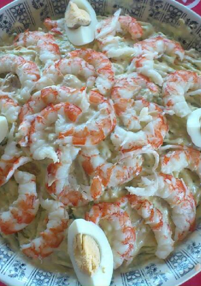 Una foto de Pastel de patata con merluza y gambas