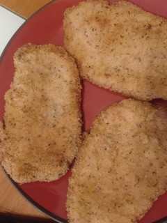 Una foto de Cinta de lomo empanada con parmesano
