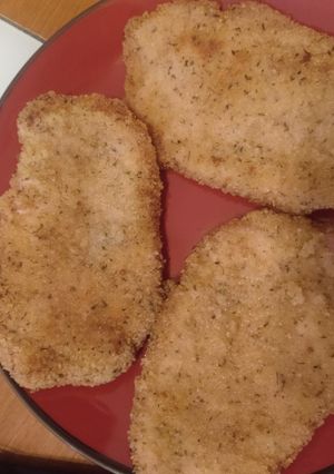 Una foto de Cinta de lomo empanada con parmesano