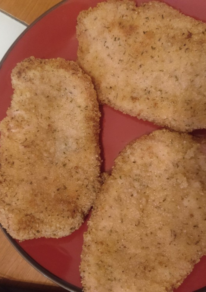Una foto de Cinta de lomo empanada con parmesano