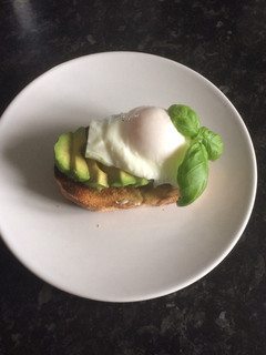 A picture of Poached egg and avocado on toast.