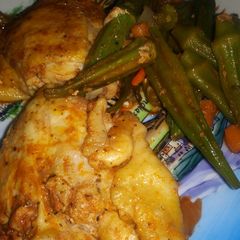 Grilled Chicken Thighs With whole Orka- Carrots A picture of Grilled Chicken Thighs With whole Orka- Carrots.