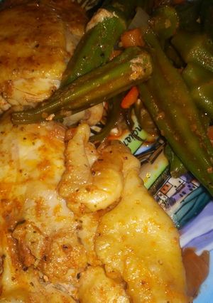 A picture of Grilled Chicken Thighs With whole Orka- Carrots.