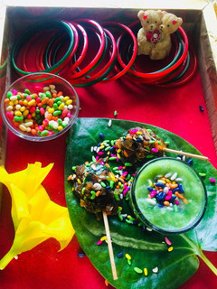 A picture of Paan Shots and Gulkand lollipops.