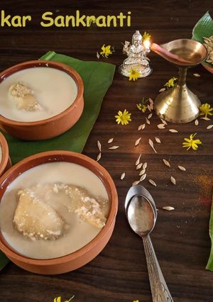 A picture of Dudh Puli Rice dumplings cooked in milk.