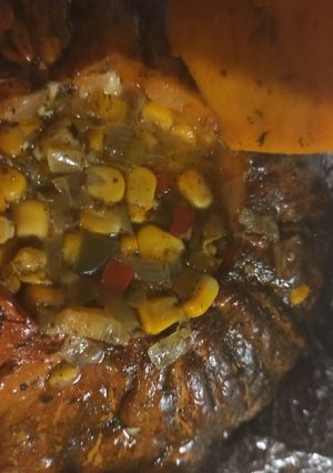 Una foto de Zapallo relleno con choclo y mozzarella