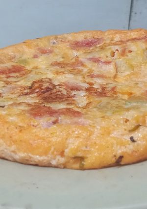 Una foto de Tortilla grande con vegetales