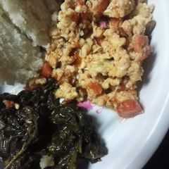 A picture of Fried kienyeji eggs served with green veges.