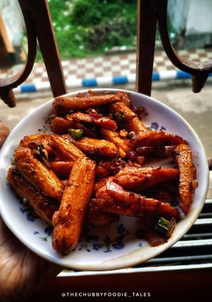 A picture of Chilli fried cocktail sausage.