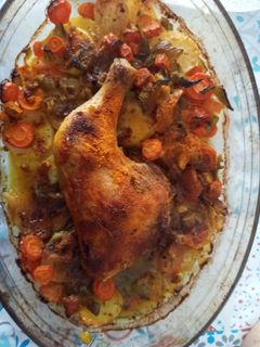 Una foto de Muslos de pollo al curry