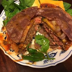 A picture of California Farm Classic Beefsteak Tomato Wagyu Cheeseburger.