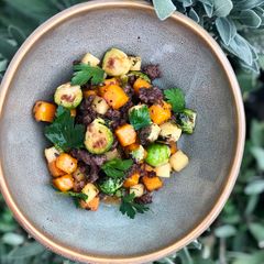 A picture of Wagyu Bratwurst and Butternut Squash Hash.