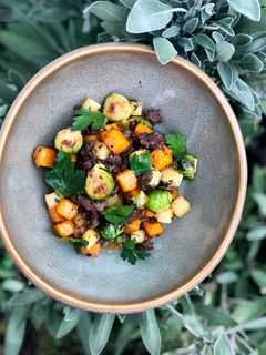 A picture of Wagyu Bratwurst and Butternut Squash Hash.
