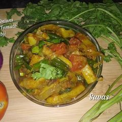 Green Onions Potato Tomato Sabji A picture of Green Onions Potato Tomato Sabji.