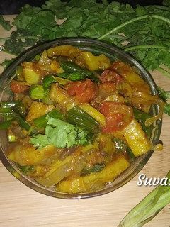 A picture of Green Onions Potato Tomato Sabji.