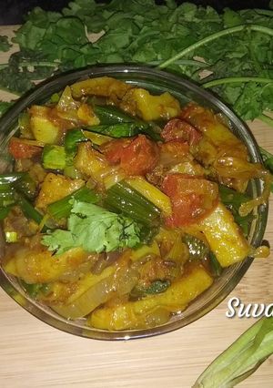 A picture of Green Onions Potato Tomato Sabji.
