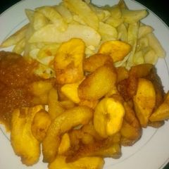 A picture of Fried potatoes and plantain.