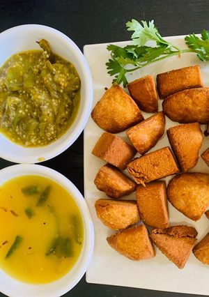 A picture of Daal Baati with Baigan Sabzi.