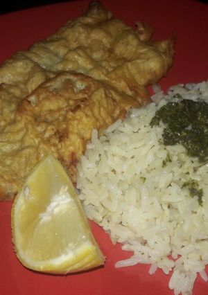 Una foto de Escalope con arroz delicioso👌