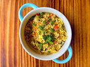 A picture of cabbage and eggs fried rice