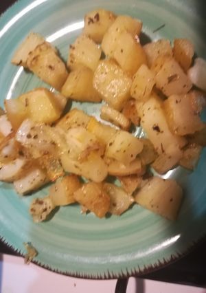 Una foto de Patatas con orégano