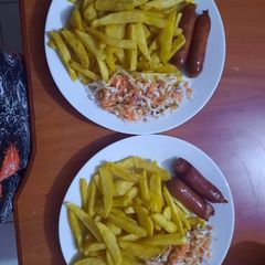 A picture of Fries with smokies.