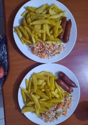 A picture of Fries with smokies.