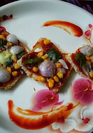ব্রেড পিজ্জা (bread pizza recipe in Bengali) রেসিপির প্রধান ছবি