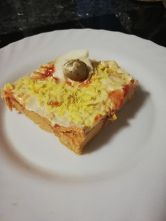 Una foto de Pastel de atún y pimientos de piquillo al microondas