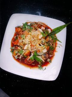Hình của món Trứng cút lộn xào me.