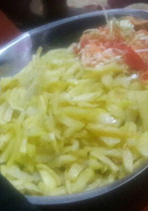 A picture of Fries and salad.