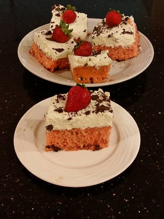 A picture of Fresh Strawberry Chip Cake with Lemon Cream Frosting.