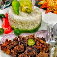 A picture of Fried meet with rice.