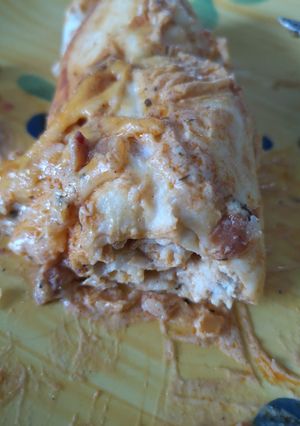 Une photo de Tortillas au poulet sauce Tikka massala