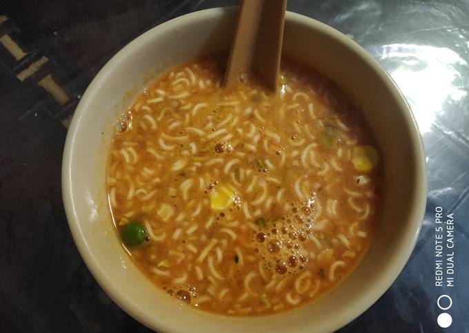 Tomato with noodles soup