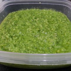 A picture of Pesto sauce with cashew nuts.