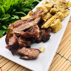 A picture of Open fire roasted Pork.