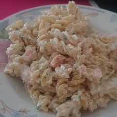 A picture of Fusilli with salmon and cream.