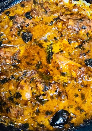 A picture of Peri peri chicken with gravy.