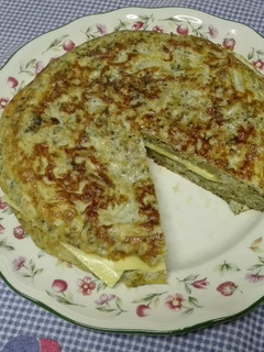 Una foto de Tortilla de brócoli rellena de queso