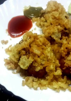 A picture of Chicken Kobiraji/ Cutlets wrapped in an egg nest.