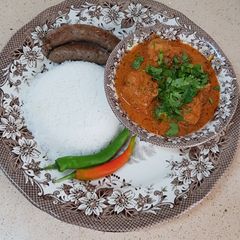 A picture of Thai red chilli chicken curry.